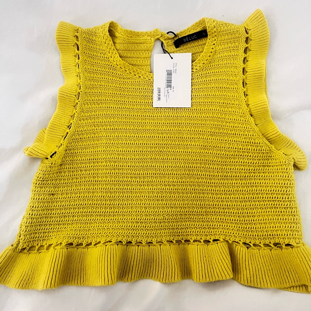 Cropped flutter sleeve sweater.